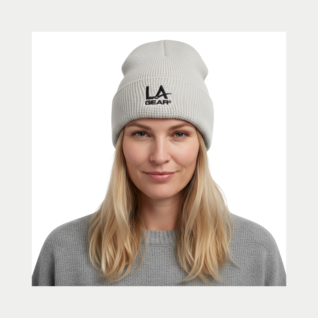 Women wearing a LA Gear cuffed waffle beanine in off-white.