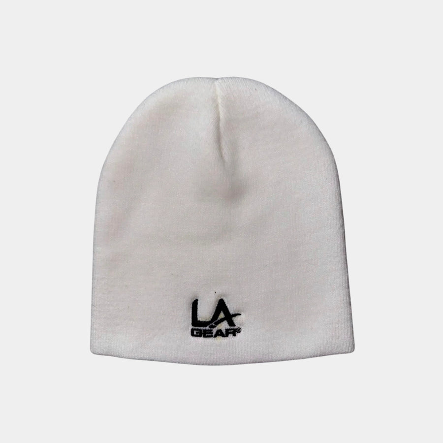 Off-white beanie with LA Gear logo on a white background