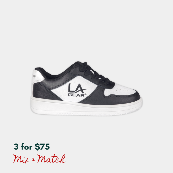 Black and white lowtop sneaker with 'LA Gear' logo on a light gray background