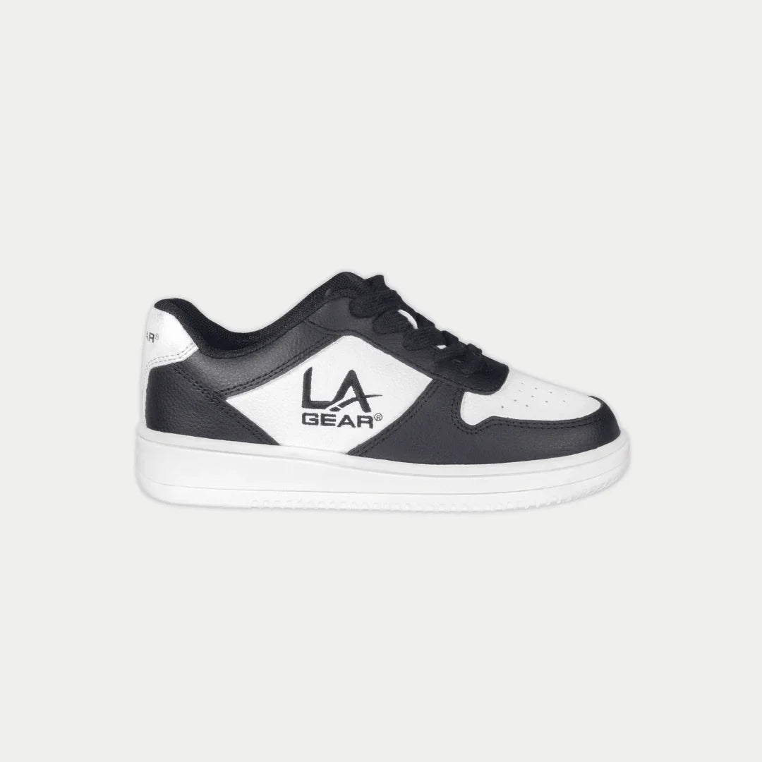 Black and white lowtop sneaker with 'LA Gear' logo on a light gray background
