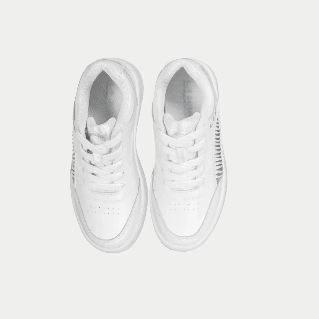 Pair of white lowtop sneakers on a light gray background