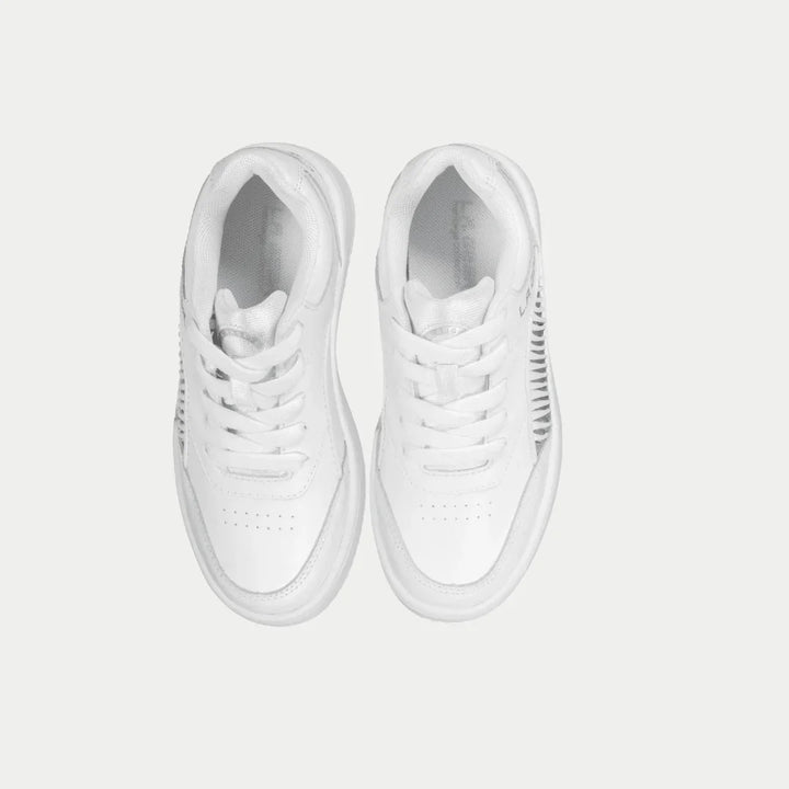 Pair of white lowtop sneakers on a light gray background