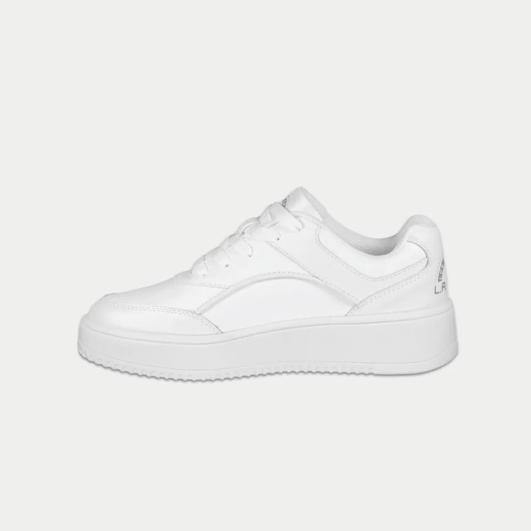 White lowtop sneaker on a light gray background