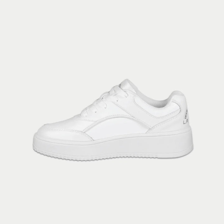 White lowtop sneaker on a light gray background
