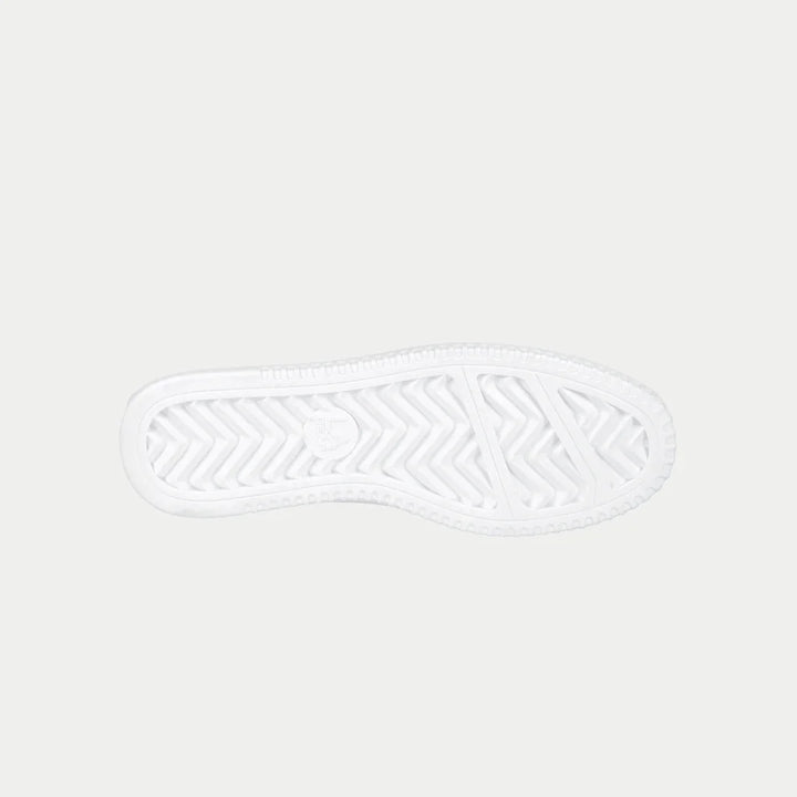 White lowtop sneaker sole with a geometric pattern on a white background