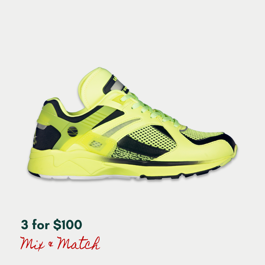 LA Gear neon yellow and black glow-in-the-dark and light-up sneaker.