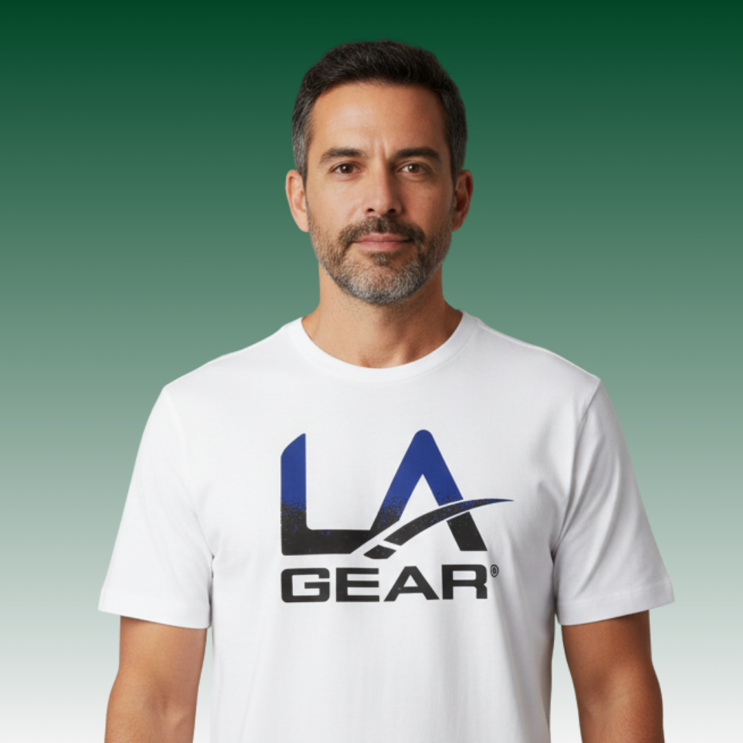 Man wearing a white t-shirt with 'LA Gear' logo against a gradient background.