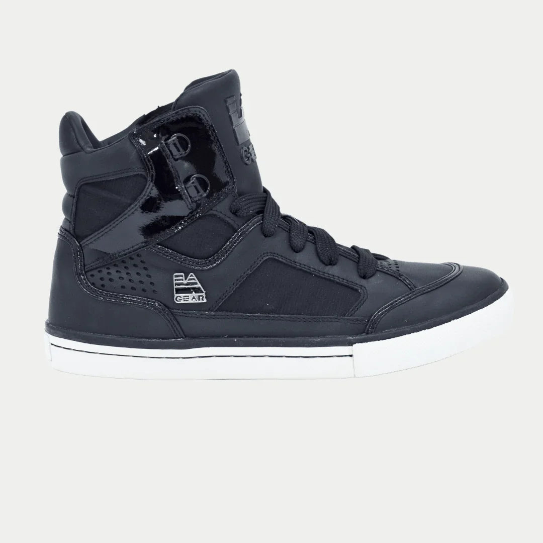 Black hightop sneaker on a light gray background