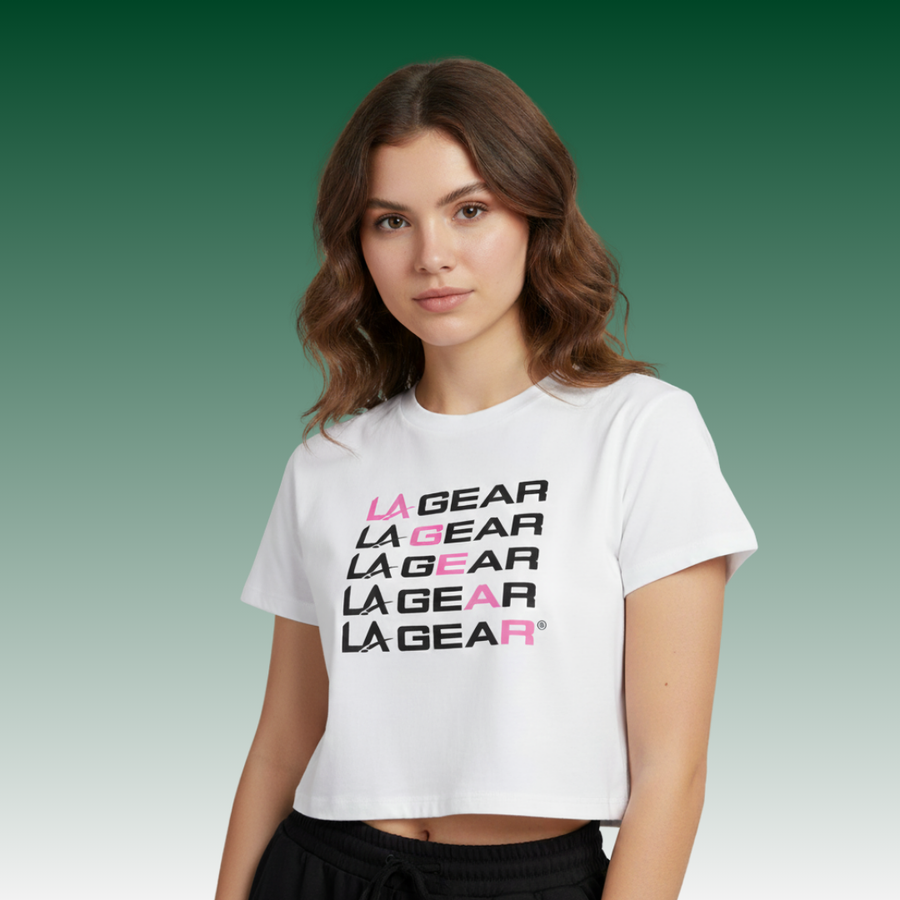 Woman wearing a white t-shirt with 'LA GEAR' branding on a gradient background
