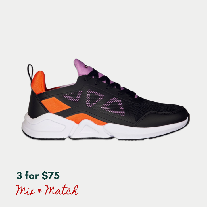 Black and orange LA Gear sneaker with pink accents on a light gray background