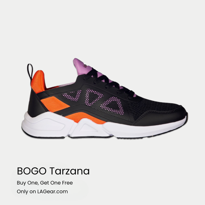 Black and orange sneaker with purple accents on a light gray background