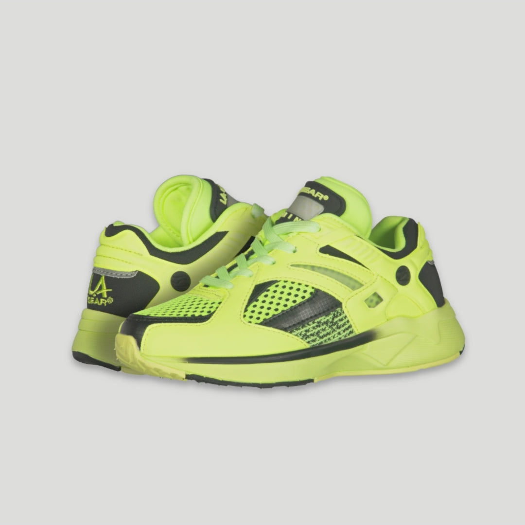 LA Gear neon yellow x black  lowtop sneaker, motion-activated light-up tongue and glow-in-the-dark accents that shine long after the lights go out. 