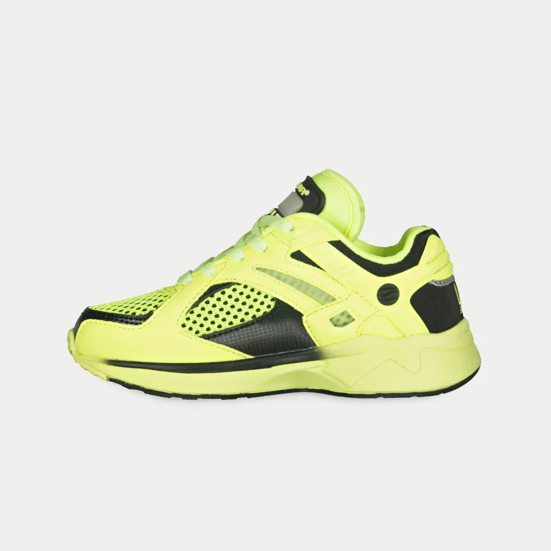 Neon yellow lowtop shoe with black accents on a light gray background