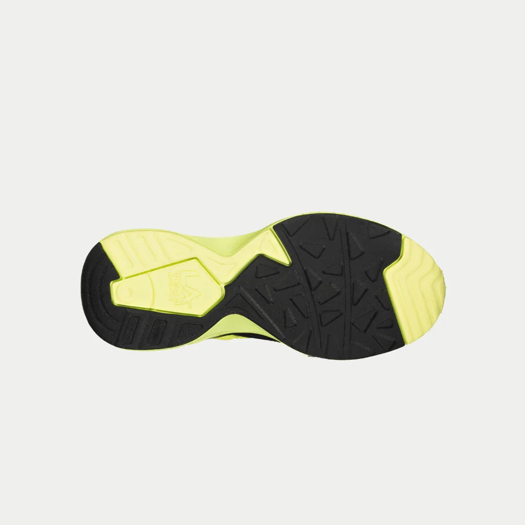 Sole of a black and yellow athletic shoe on a light gray background