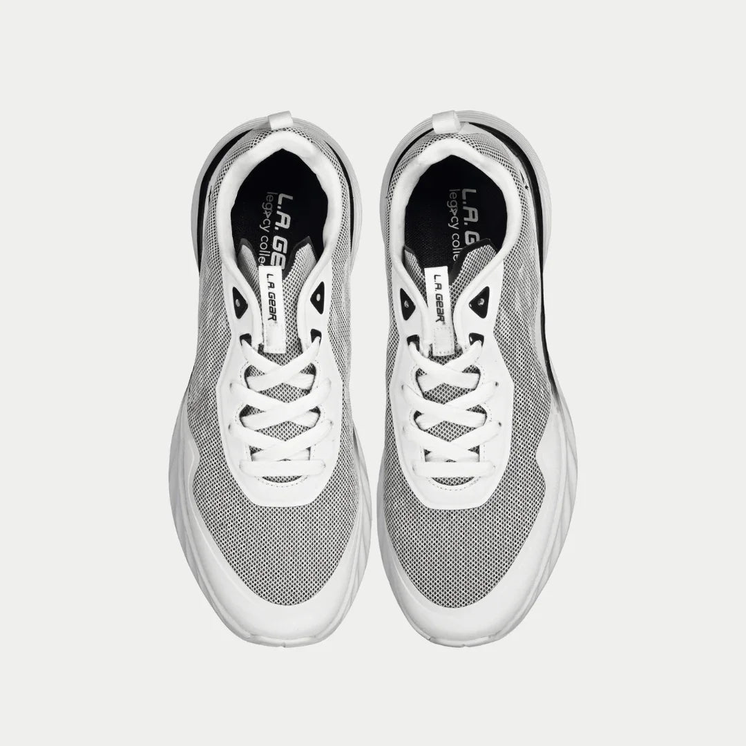 White x black sneakers with 'L.A. Gear' branding on a light gray background