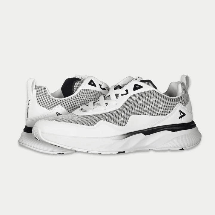 White x black athletic shoes with a brand logo on a light gray background