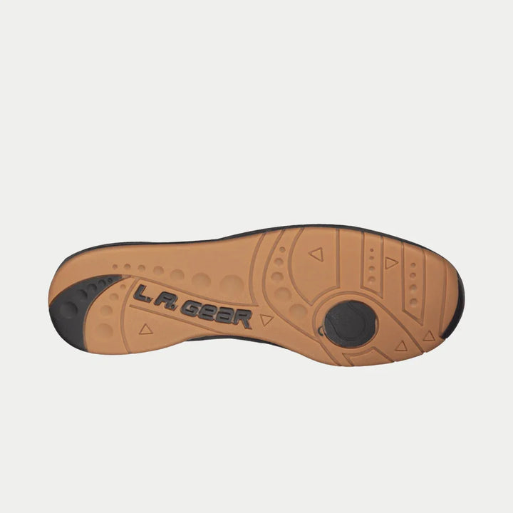 Brown shoe sole with 'LA Gear' branding on a white background