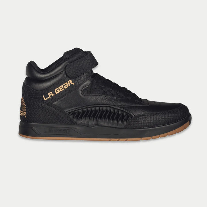 Black hightop sneaker with 'LA Gear' branding on a light gray background
