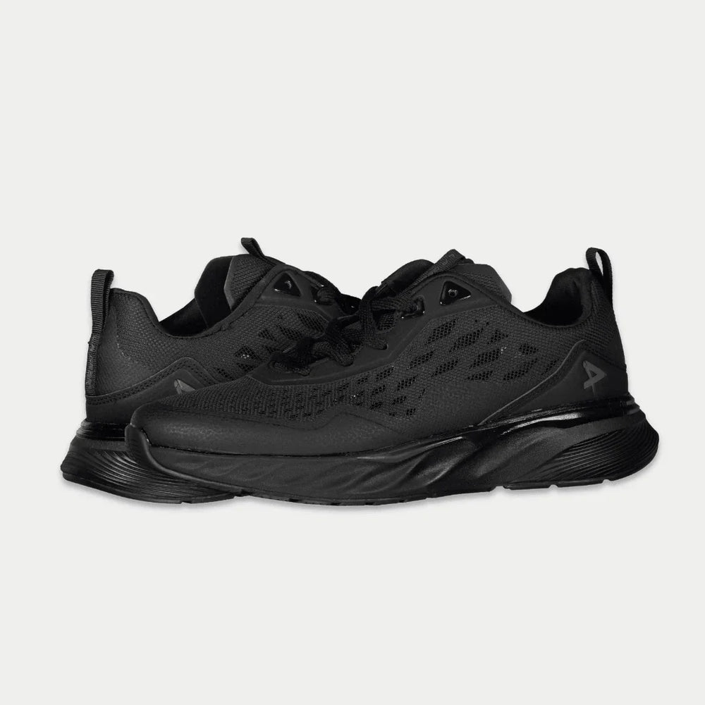 Black sneaker on a light gray background