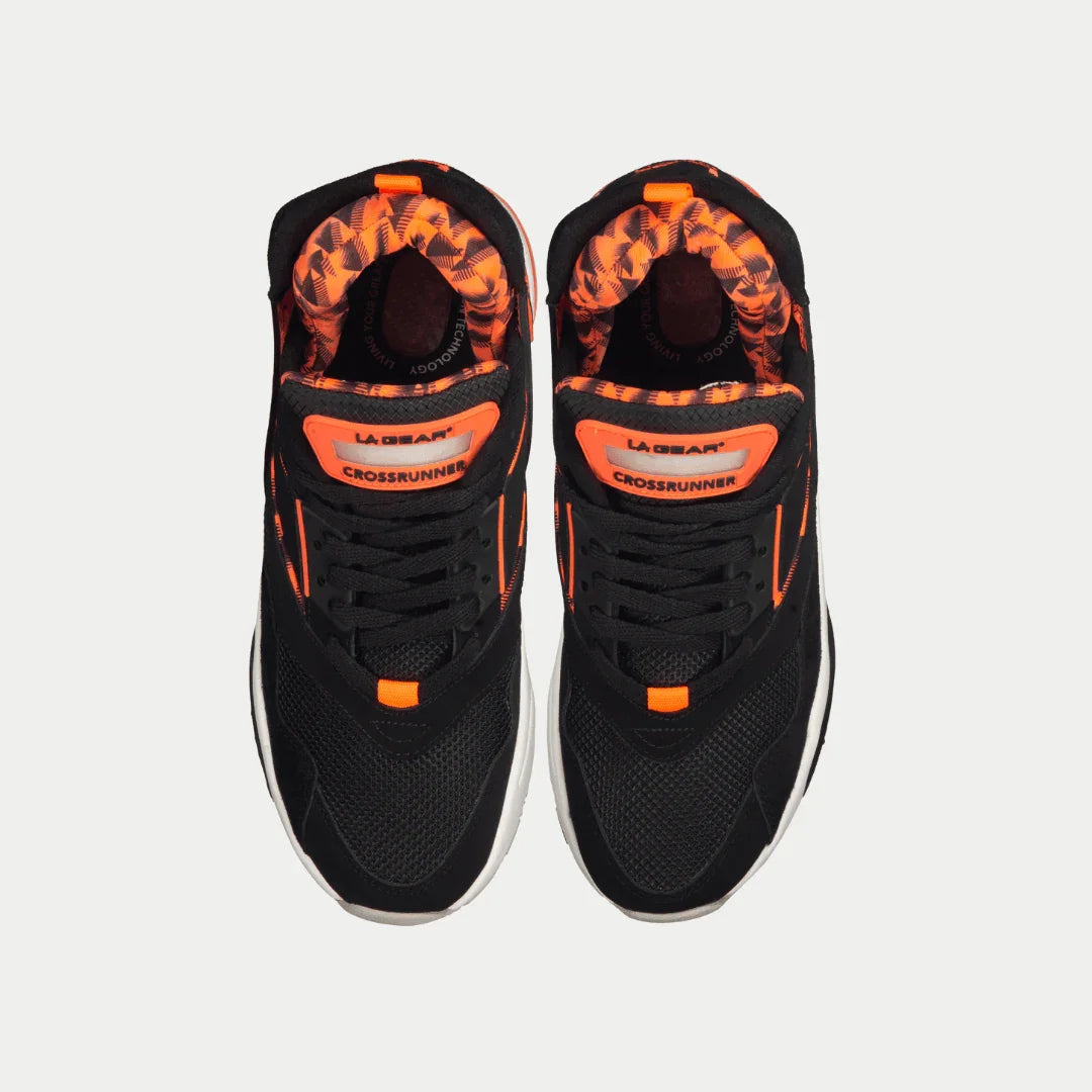 Black x neon red light-up mid sneaker  with LA Gear branding on a light gray background.