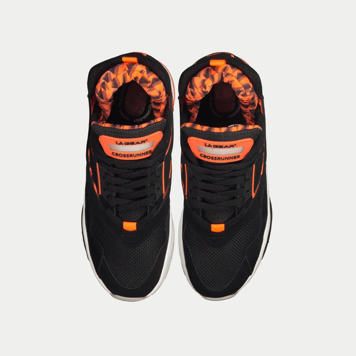 Black x neon red light-up mid sneaker  with LA Gear branding on a light gray background.