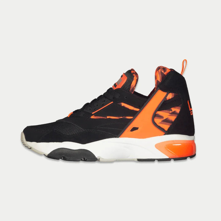 Black x neon red light-up mid sneaker  on a white background