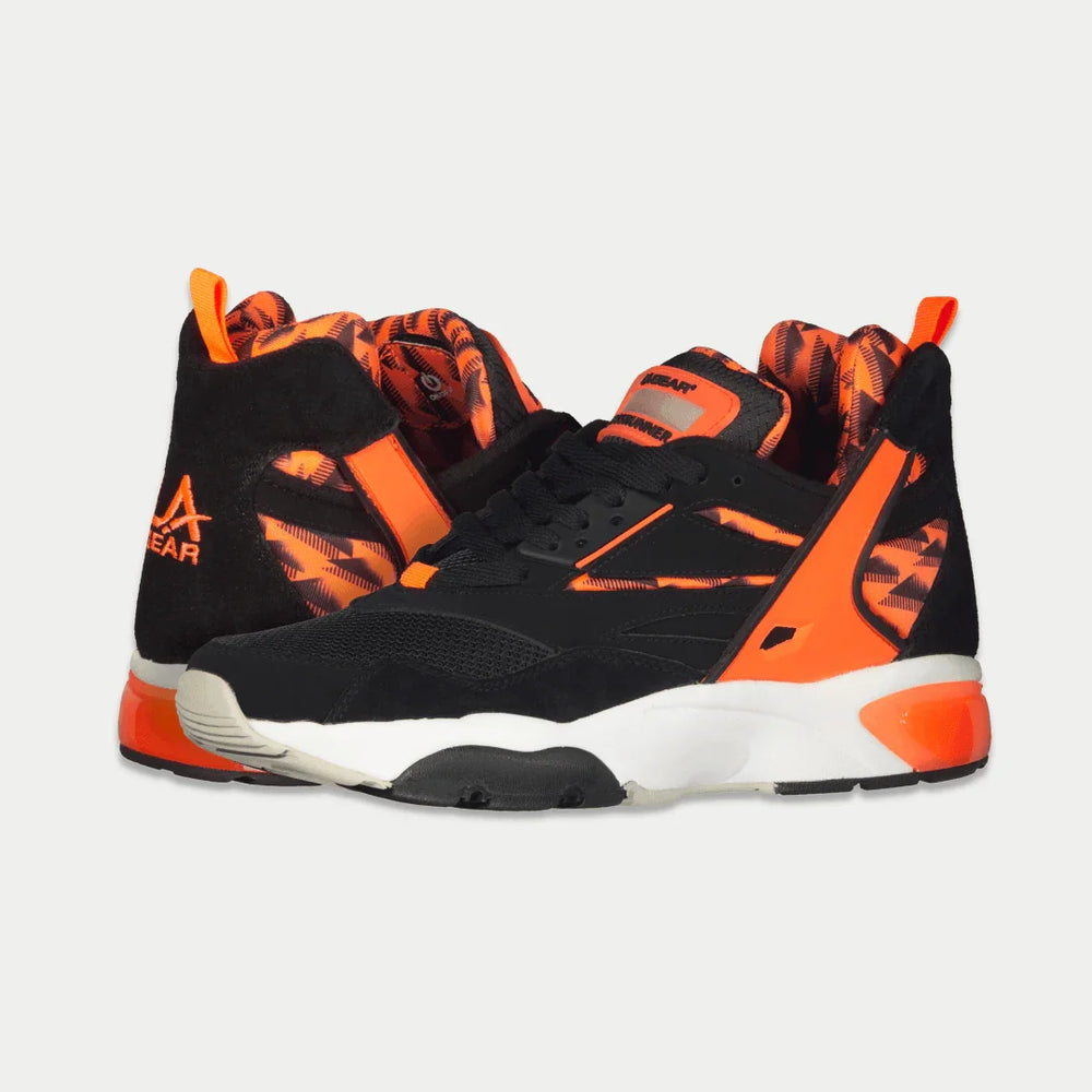 Black x neon red light-up sneakers with a visible brand logo on a light gray background.