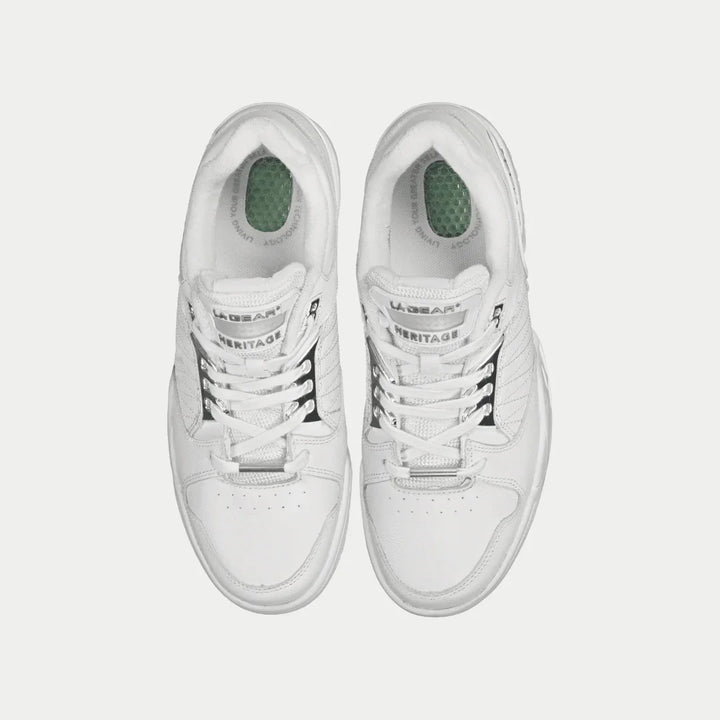 White sneakers with 'LA Gear' branding on a white background