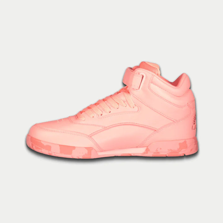 Neon peach hightop sneaker on a light gray background