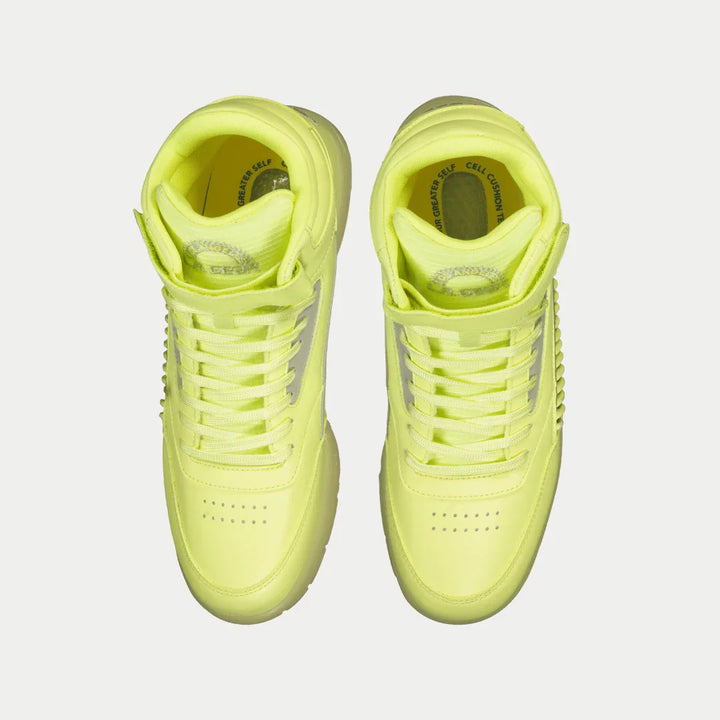 Pair of neon yellow hightop sneakers on a light gray background