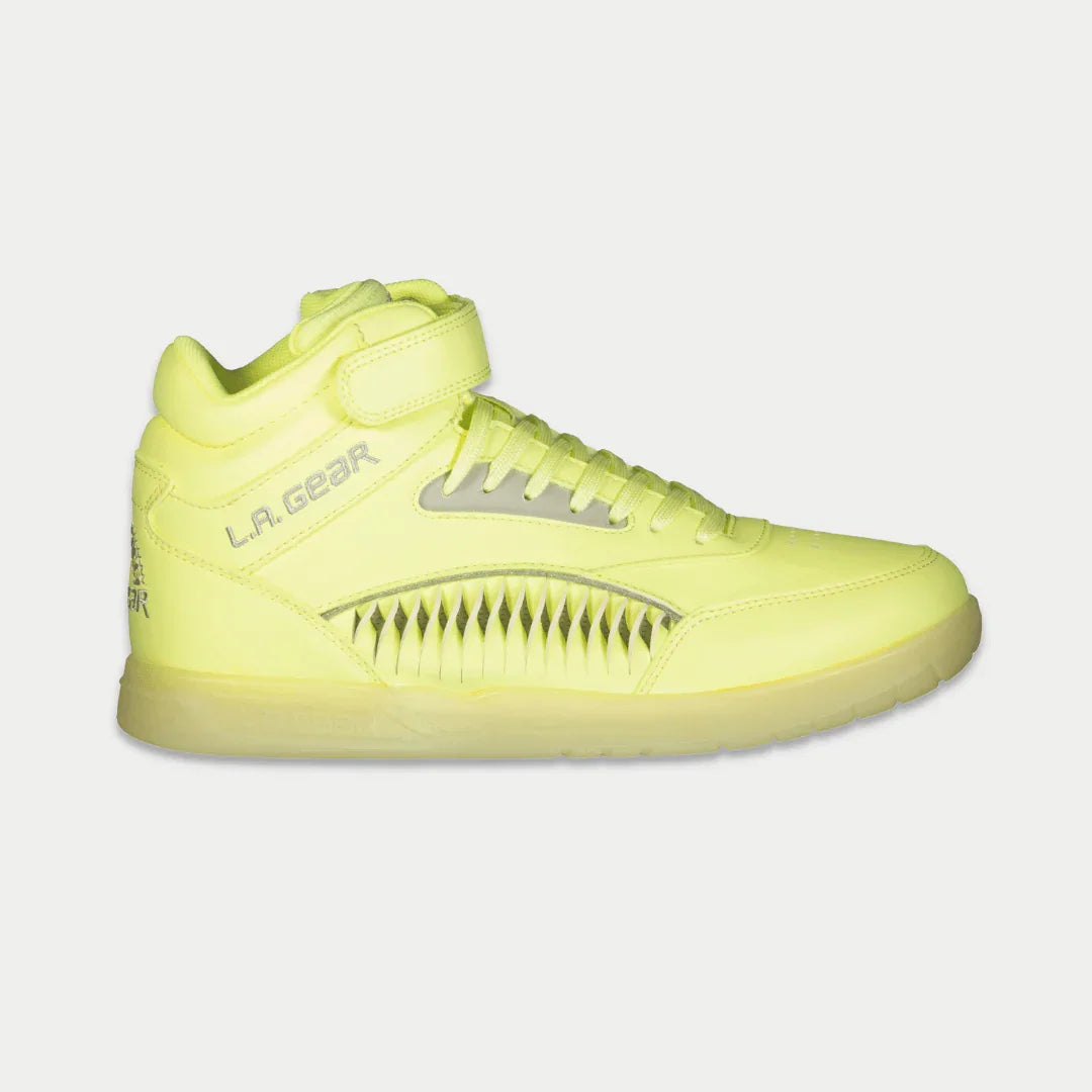 Neon yellow sneaker with 'L.A. Gear' branding on a light gray background