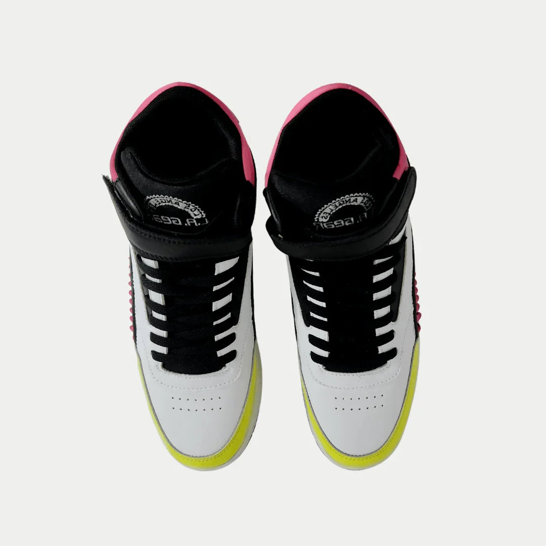 Pair of high-top sneakers with white, black, and lime color scheme on a light gray background