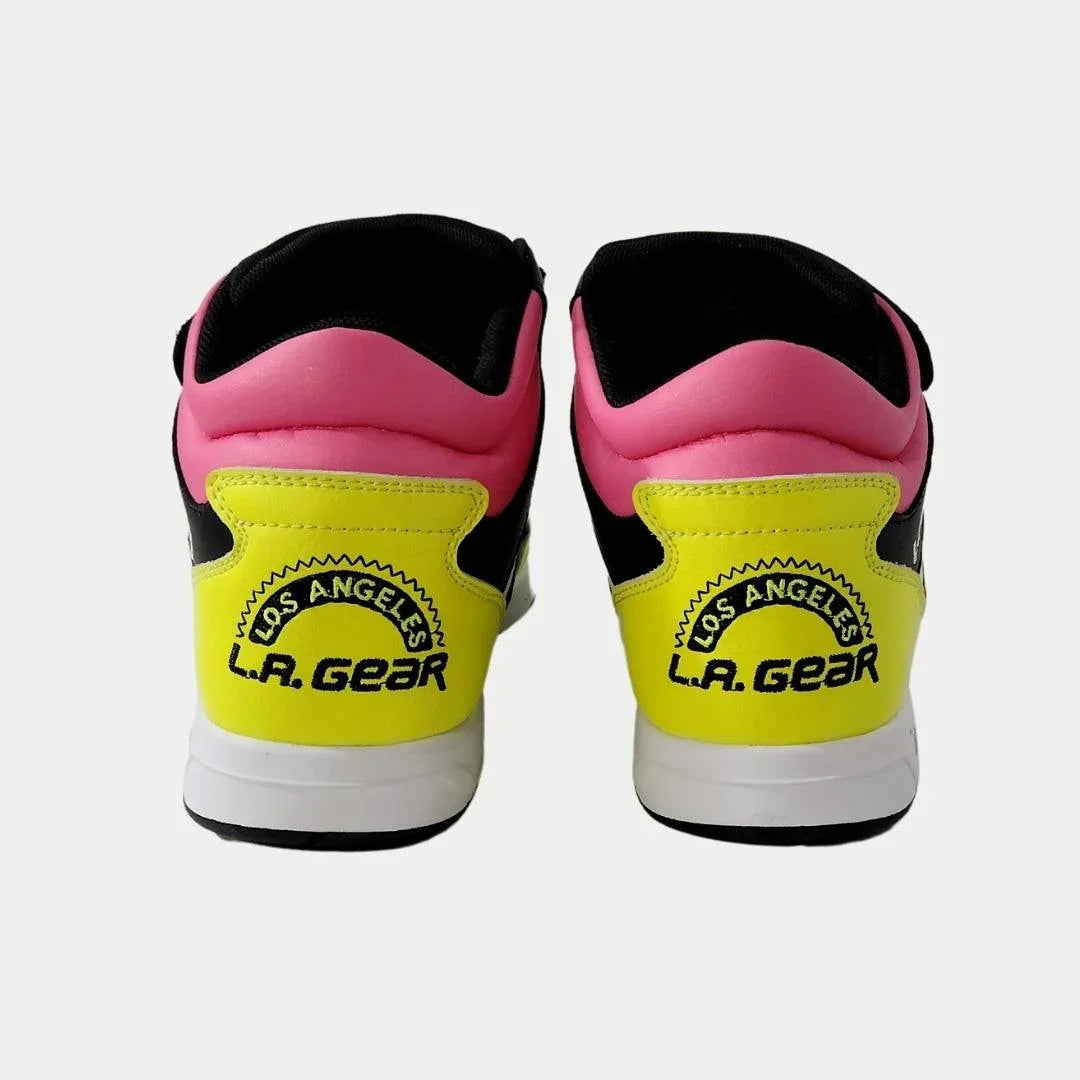 Pink and black shoes with lime sole displaying 'L.A. Gear' logo on a white background