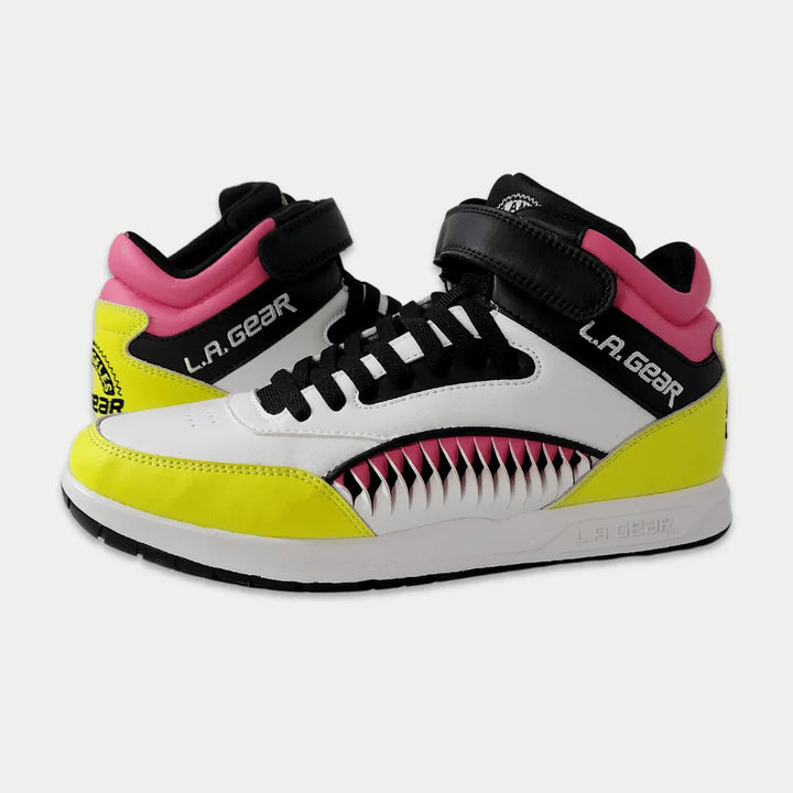 Pair of L.A. Gear sneakers with pink and lime accents on a white background