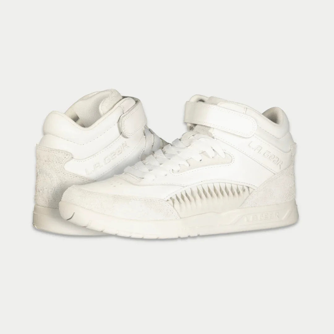 White hightop sneakers on a light gray background