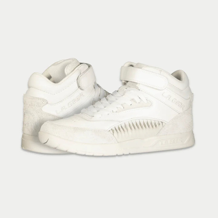 White hightop sneakers on a light gray background