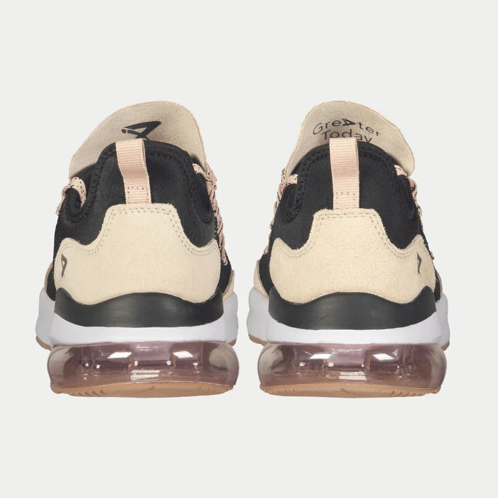 Black and pink sneakers with clear sole on a white background