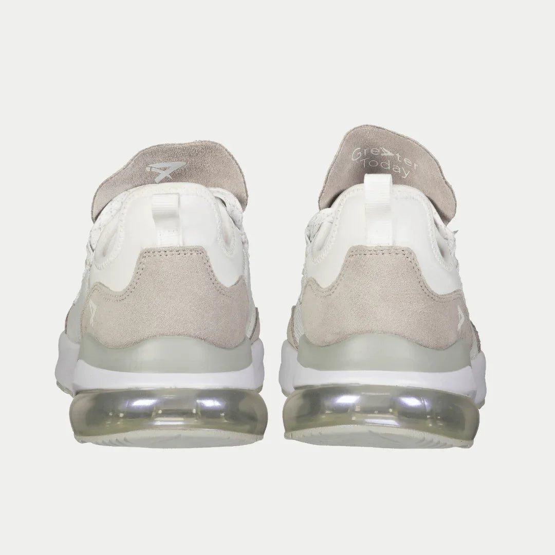 Pair of white x gray sneakers with transparent sole on a light gray background